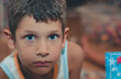 © BlackMac - Portrait of kid with blue eyes and with intense stare