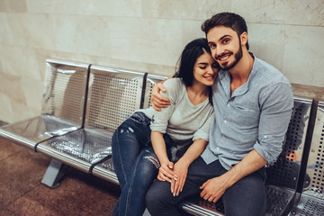 Wall Mural - Young romantic couple in subway