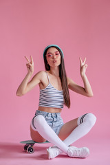 Poster - Young girl on pink background