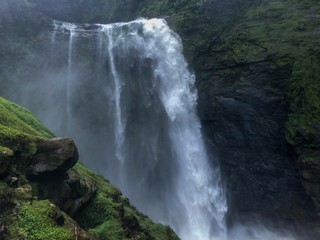 Beautiful aerial view of big waterfall in Costa Rica inside the mountains