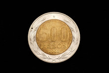 Close Up Of A Chilean Bimettalic 500 Peso Coin Isolated On A Black Background