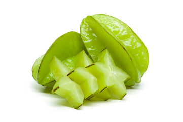 Starfruit or carambola on white background, isolated whole exotic tropical fruits and sliced another, healthy food, diet nutrition 