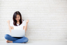 Beautiful Of Portrait Asian Young Woman Excited And Glad Of Success With Laptop Computer, Girl Sitting Working On Cement Brick Background, Career Freelance Business Concept.