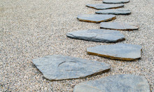 Simple Stone Path In Smooth Gravel With Copy Space At A Japanese Garden
