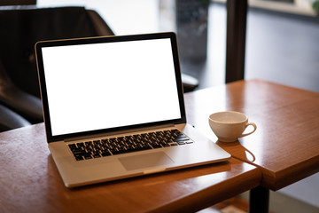 Wall Mural - laptop with blank screen on table. workspace background new project on laptop computer with blank co