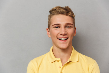 Poster - Close up portrait of a cheerful teenage boy