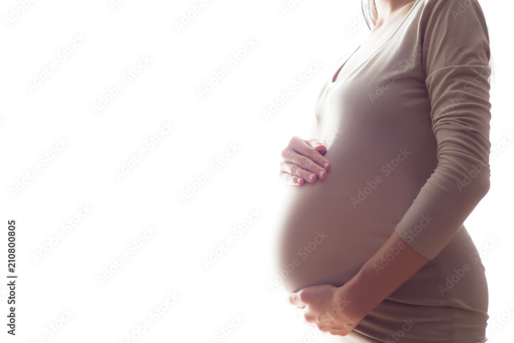 Motherhood. Pregnancy. People and Expectation Concept. Close Up of Pregnant Woman With Big Belly at Window. Pregnant Silhouette - obrazy, fototapety, plakaty 