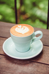 Hot coffee  ready to drink on wood table background