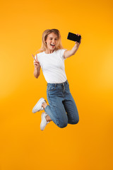 Poster - Full length portrait of a cheerful young blonde girl