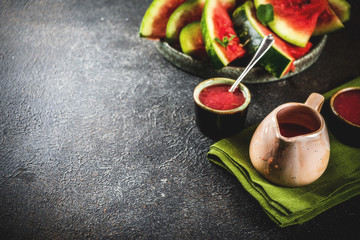 Wall Mural - Homemade sweet and sour watermelon sauce, dark rusty background copy space top view