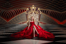Blonde Woman Sitting On The Throne