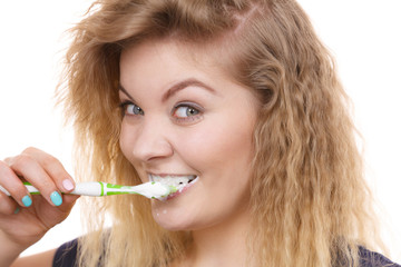 Wall Mural - Woman brushing cleaning teeth