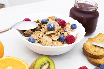 cup of cereals with natural fruits, healthy and balanced breakfast