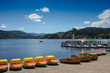 Yellow boats at the promenade beach of Titisee in the Black Forest / Germany