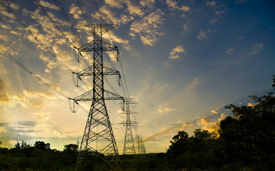 electricity pole , high voltage tower  with sunset background