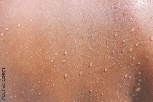 Cuadros en Lienzo Water drops on woman skin, close up of wet human skin texture