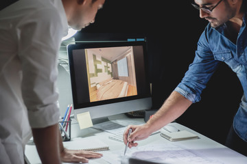 Wall Mural - Architect team discussing project at night