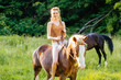 Beautiful woman on a horse. Horseback rider, woman riding horse. Riding lesson and leisure concept.