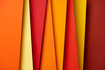 Paper sheets in warm colors background