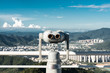 © Kike Arnaiz/ADDICTIVE STOCK - Binocular on viewpoint with cityscape