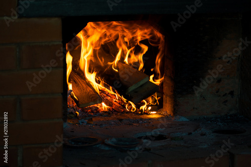 Crest Of Flame On Burning Wood In Fireplace Burning Firewood In A