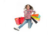 © be free - Happy girl jump with shopping bags isolated on white. Little shopaholic smile with paper bags. Child shopper fashion. Shopping and sale. Birthday holiday preparation. Black friday. Fun in motion