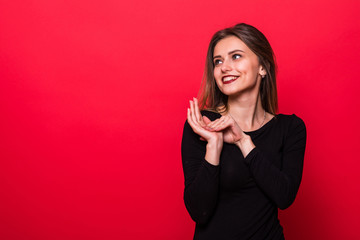 Attractive smile happy woman on color red background