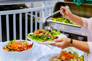 Wall Mural - Greek vegetable salad with top view fresh healthy spring salad bowl