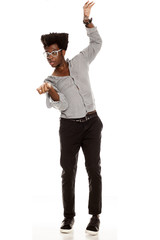 Wall Mural - young exited handsome afro american guy stylish hipster dancing isolated on white background . people lifestyle concept