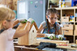 © pikselstock - Two young girls doing woodwork in a workshop