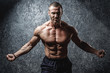 © blackday - Strong and muscular bodybuilder showing his body
