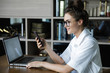 © blackday - Young businesswoman is talking by smartphone