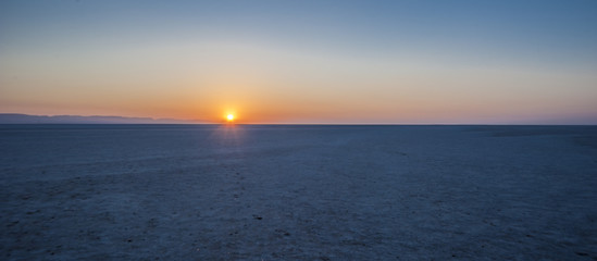 Sunrise over the salt lake of El Jerid.