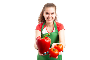 Poster - Woman supermarket or retail worker offering fresh vegetables.