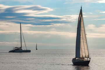 Canvas Print - Blue sailboat at Baltic sea