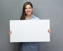 Smiling Woman Holding White Board For Advertising Signs.