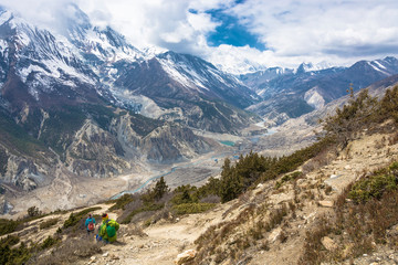 Two tourists look at the valley of the river Bagmati, Nepal.