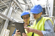 © goodluz - Industrial engineers working in recycling plant with tablet