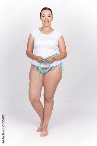 Beautiful Size Plus Model Girl Having Measurement With Tailor