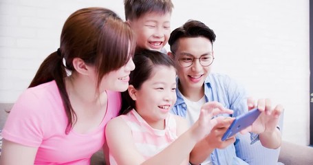 Poster - family use phone happily