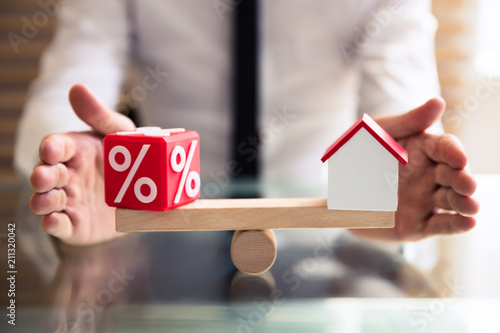 Fotomural Protecting Balance Between Percentage And House Model