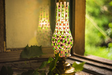 Mosaic Lamp On The Window