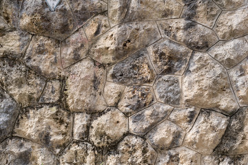 Wall Mural - Old stone wall as texture or background. Old exterior wall with big rocks.