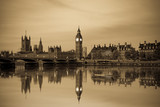 Fototapeta Londyn - Vintage picture of London Big Ben and House of Parliament with reflection in London. England