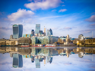 Wall Mural - Skyscrapers in financial district with reflection in London. England