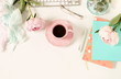 Flat lay women's office desk. Female workspace with laptop,  flowers peonies,  accessories, notebook, glasses, cup of coffee on white background. Top view feminine background.Copy space