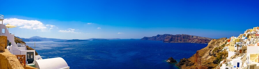 Panorama of Oia. Blue domes  and aegean sea.Santorini.Greece