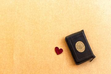 red heart and quran islamic book 