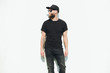 © 4Max - Hipster handsome male model with beard wearing black blank t-shirt with space for your logo or design in casual urban style