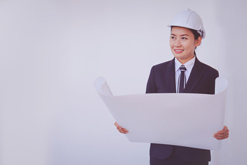 Business woman wearing white helmet